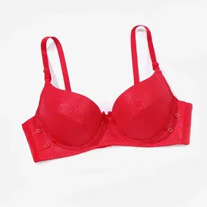 Elegant red textured PU leather push-up bra with padded cups and adjustable straps