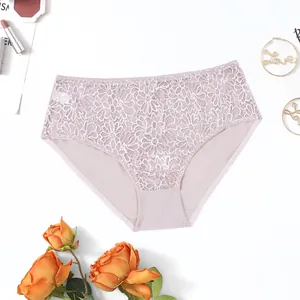 Detailed view of elegant mauve lace panties with floral embroidery and semi-transparent mesh