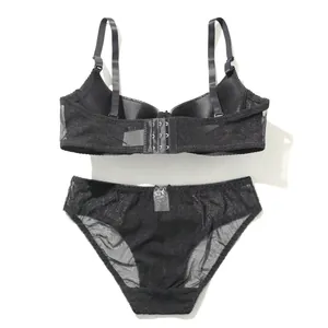 Back view of black PU leather and mesh lingerie set with triple hook-and-eye closure