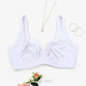Detailed view of white floral lace push-up bra with underwire support