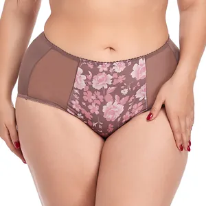 Macro detail of plus-size floral print high-waist briefs with breathable mesh panels