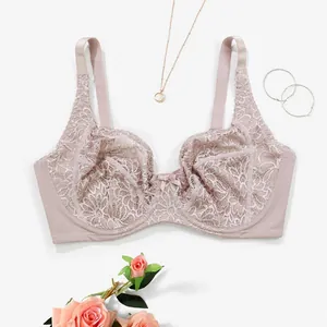 Detailed view of an elegant lace push-up bra with floral embroidery and underwire support.
