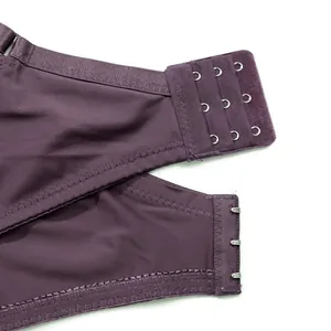 Detail shot of the 3-row hook-and-eye back closure of a purple plus size bra