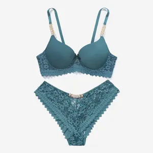 Teal lace lingerie set featuring rhinestone metal chain straps and intricate floral details