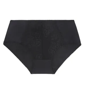 Detail of the elegant floral lace embroidery on black high-waisted plus size briefs