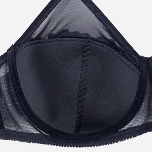 Detailed view of inner cup texture and breathable mesh on black plus size underwire bra