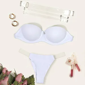 White strapless bra and thong set with detachable clear straps for a seamless look