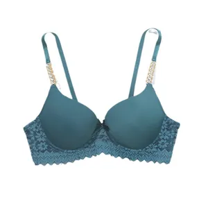 Detailed view of sexy lace push-up bra featuring sparkling rhinestone chain straps