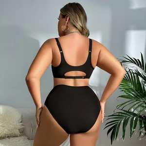 Back view of black plus size seamless wireless bra and high-waisted panty set
