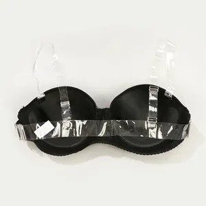 Detailed view of backless bra with adjustable transparent shoulder and back straps