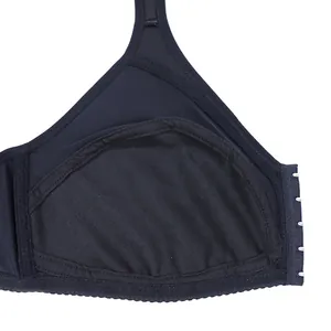 Detail view of black wire-free bra showing soft inner lining and side hook closure