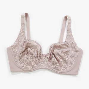 Close-up of pink floral lace underwire bra with intricate embroidery detailing