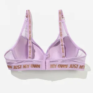 Detailansicht eines lila Push-up-BHs mit glitzernden 'JUST MY OWN' Trägern hinten.
