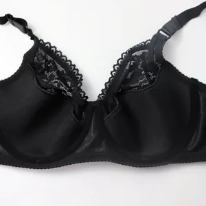 Close-up detail view of black lace full cup bra with breathable thin mesh and floral patterns