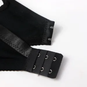 Close-up detail of black bra back closure with three rows of durable hooks and eyes