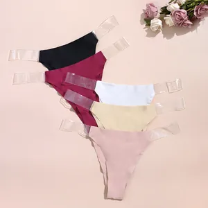 Detailed view of seamless G-string thongs with transparent straps in multiple colors