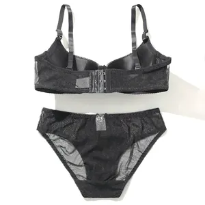 Sexy black PU leather lingerie set featuring a push-up bra and sheer mesh panties