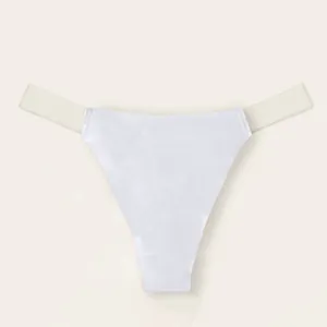 Elegant seamless white thong with invisible transparent side straps for wedding dresses