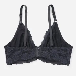 Detailed view of the back and adjustable straps of a sexy black floral lace bra