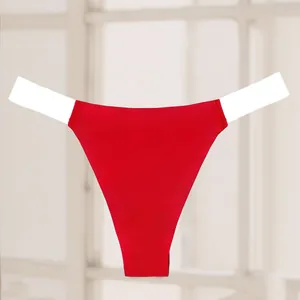 Close-up detail of red seamless thong with wide white elastic high-cut waistband