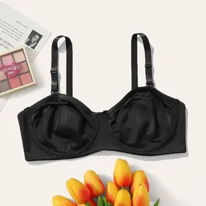 Close-up view of a black plus size unlined demi bra featuring supportive underwire