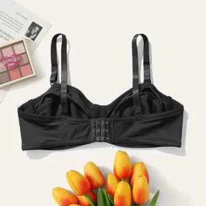 Detail view of the back of a black thin underwired half cup bra for larger sizes.