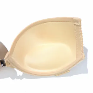 Close-up detail showing the soft inner lining and front buckle of a nude invisible bra cup
