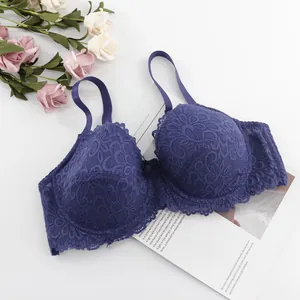 Detailed view of a purple lace full cup push-up bra with elegant bow decoration.