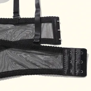 Close-up detail of black mesh bra back strap featuring a secure 3-row hook and eye closure