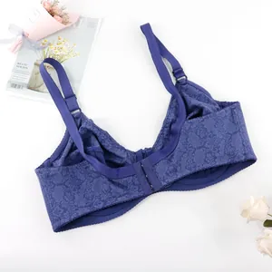 Detailed view of floral print pattern on blue thin full cup bra with 3-row hook closure