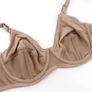 Close-up detail of a tan full coverage minimizer bra with inner cup structure.