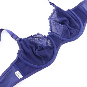 Detail view of purple lace underwire bra showing soft breathable interior and cup