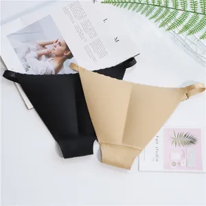 Close-up of seamless thong panties with adjustable side straps in black and beige