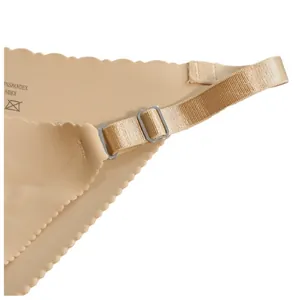 Seamless nude thong with adjustable strap and scalloped edges