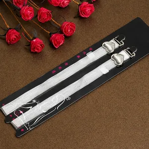 Transparent striped bra straps featuring decorative silver heart-shaped metal buckles