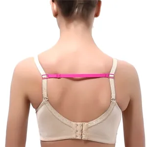 Pink adjustable elastic bra strap holder clip for sports shown on a female model back view