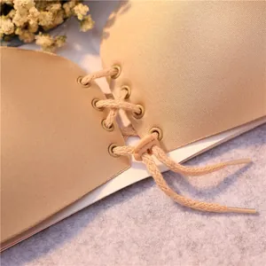 Elegant beige seamless strapless drawstring push-up bra for backless wedding dresses