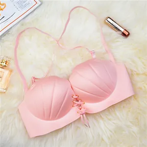 Reggiseno senza cuciture rosa a forma di conchiglia con spalline incrociate dietro
