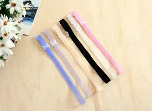 Bretelles de soutien-gorge élastiques de 1,5 cm en six coloris sur fond en bois