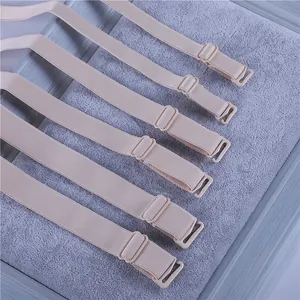 High-quality adjustable elastic bra straps in various widths on a soft textured background.