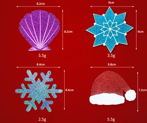 Glitzernde Weihnachts- und Muschel-Brustaufkleber mit Größen- und Gewichtsangaben.