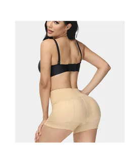 Detailed back view of mesh padded hip-lifting tummy control shaper shorts on a female model