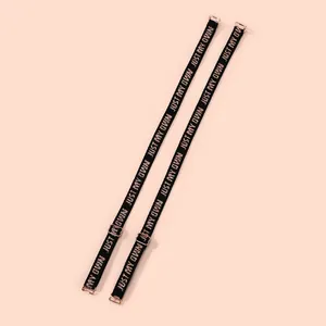 Detail of 1.2cm wide black bra straps with 'JUST MY OWN' letter jacquard elastic design