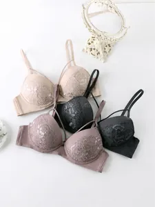 Close-up detail of lace push-up bras with elegant thin shoulder straps
