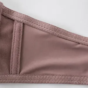 Close-up detail showing the high-quality stitching on a seamless bra side wing strap