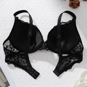 Detailed back view of a black push-up lace bra featuring intricate floral patterns