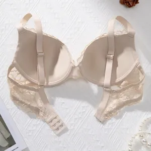 Detailed back view of a beige lace push-up bra showing strap and clasp detail