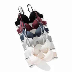 Set of comfortable push-up bras with 'Attitude' lettered elastic bands in five colors