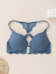 Detail view of blue ribbed lace bra with sexy racerback and front closure design