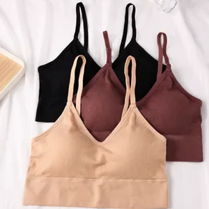 Set of three seamless ribbed U-neck sports bralettes in black, mauve, and beige tones